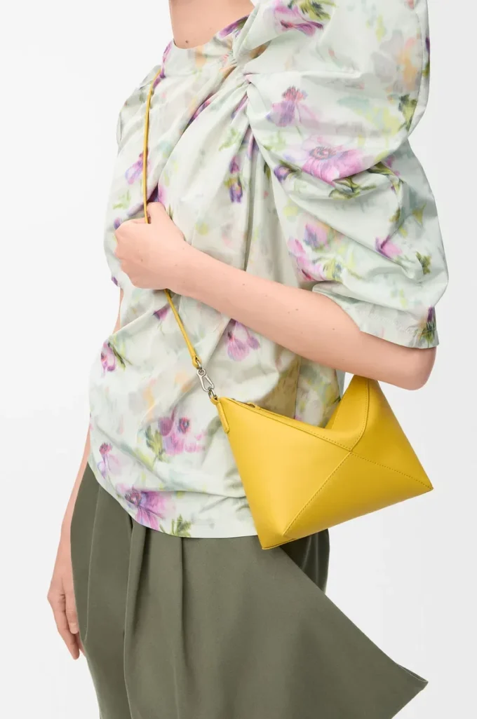 Puzzle Fold pouch in shiny nappa calfskin Dandelion Puzzle Fold pouch in shiny nappa calfskin Dandelion
