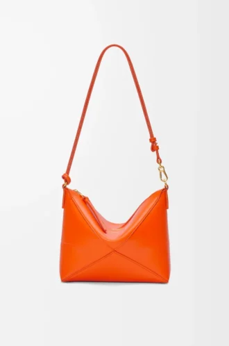 Puzzle Fold pouch in shiny nappa calfskin Vivid Orange