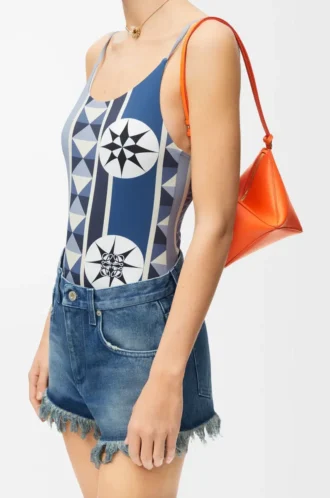 Puzzle Fold pouch in shiny nappa calfskin Vivid Orange