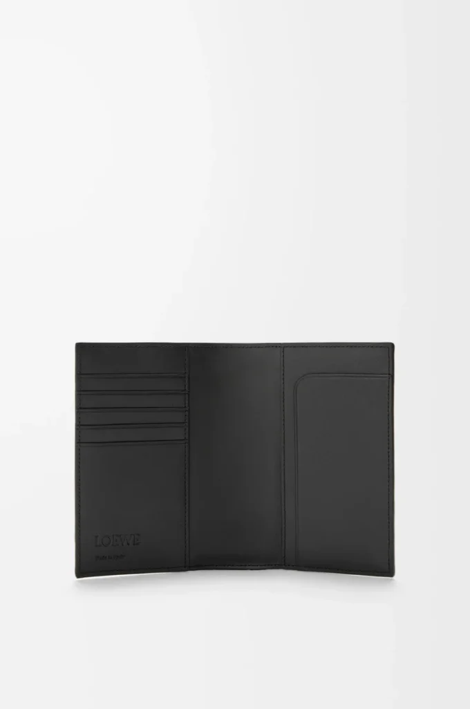 Puzzle passport cover in supple grained calfskin Black Puzzle passport cover in supple grained calfskin Black