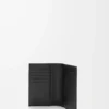 Puzzle passport cover in supple grained calfskin Black Puzzle passport cover in supple grained calfskin Black