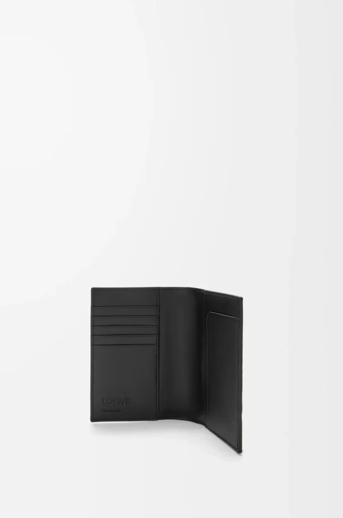 Puzzle passport cover in supple grained calfskin Black Puzzle passport cover in supple grained calfskin Black
