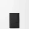 Puzzle passport cover in supple grained calfskin Black Puzzle passport cover in supple grained calfskin Black