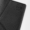Puzzle passport cover in supple grained calfskin Black Puzzle passport cover in supple grained calfskin Black