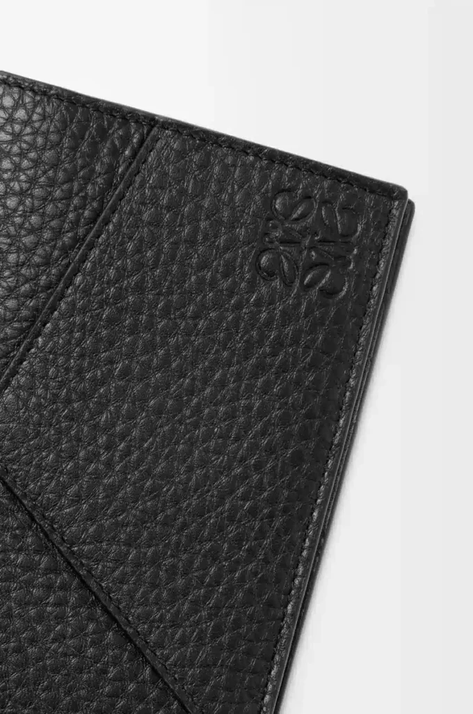 Puzzle passport cover in supple grained calfskin Black Puzzle passport cover in supple grained calfskin Black