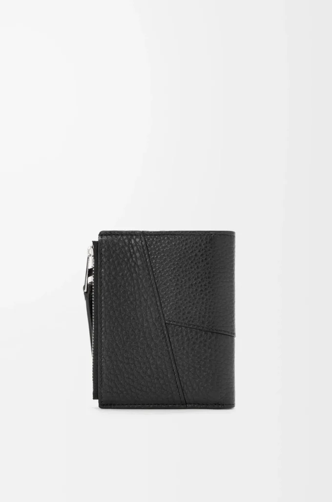 Puzzle slim compact wallet in supple grained calfskin Black