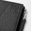 Puzzle slim compact wallet in supple grained calfskin Black