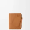 Puzzle slim compact wallet in supple grained calfskin Light Canyon Brown