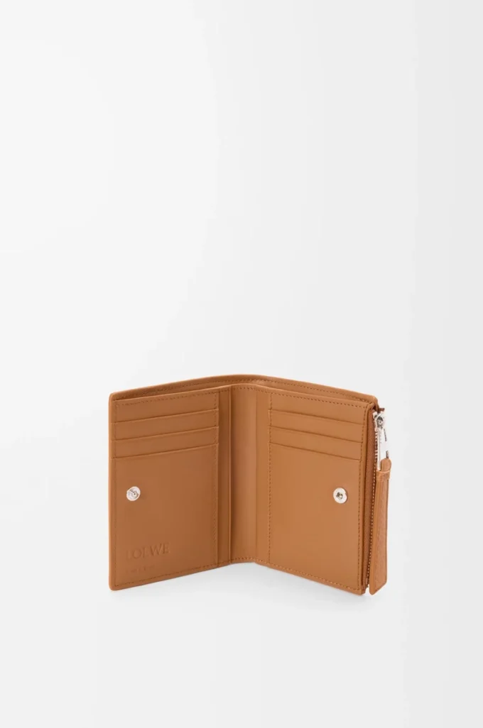 Puzzle slim compact wallet in supple grained calfskin Light Canyon Brown
