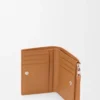 Puzzle slim compact wallet in supple grained calfskin Light Canyon Brown