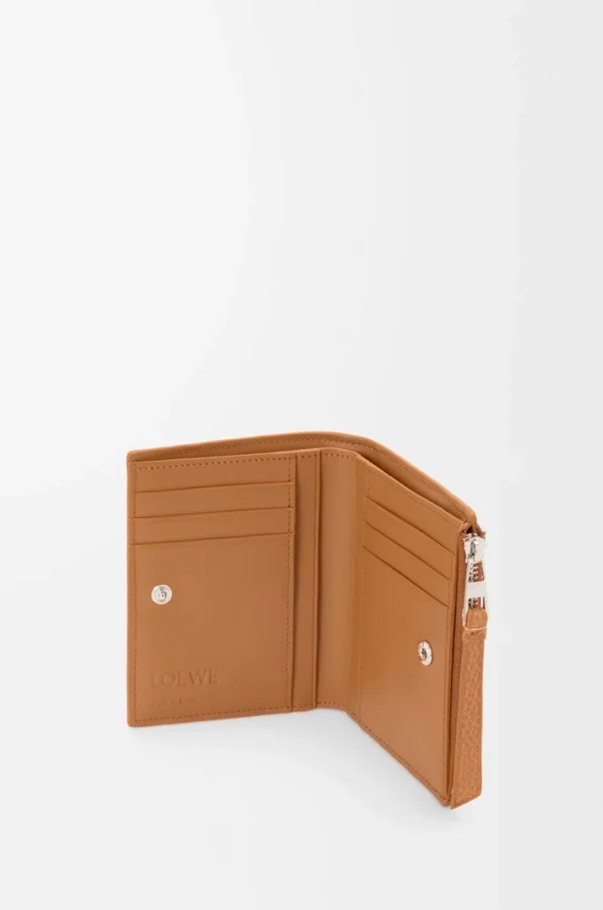 Puzzle slim compact wallet in supple grained calfskin Light Canyon Brown