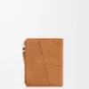 Puzzle slim compact wallet in supple grained calfskin Light Canyon Brown