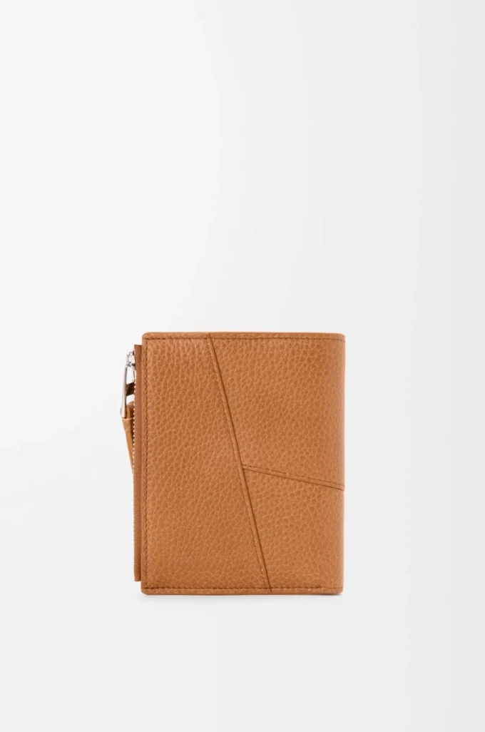 Puzzle slim compact wallet in supple grained calfskin Light Canyon Brown