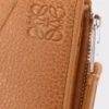 Puzzle slim compact wallet in supple grained calfskin Light Canyon Brown