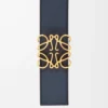 Reversible Anagram belt in smooth calfskin Black/Ocean/Gold