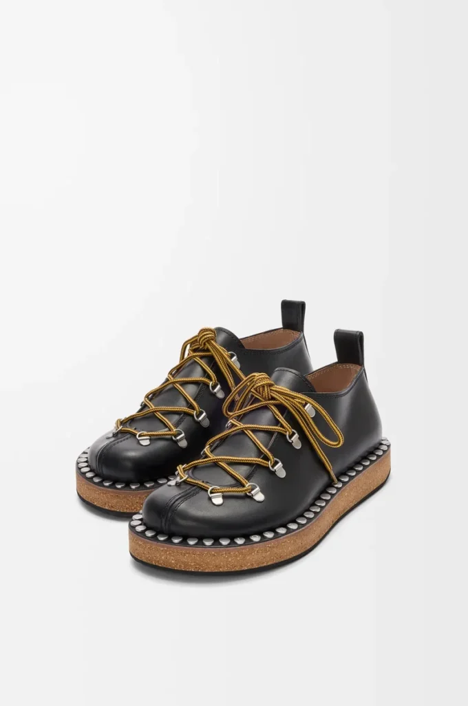 Rivet lace-up in vegetable-tanned calfskin Black