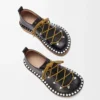 Rivet lace-up in vegetable-tanned calfskin Black