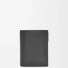Slim compact wallet in soft grained calfskin Black
