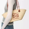Small Anagram Basket bag in iraca palm and calfskin Natural/Tan