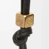 Small Anagram strap in calfskin Black Tonal/Gold