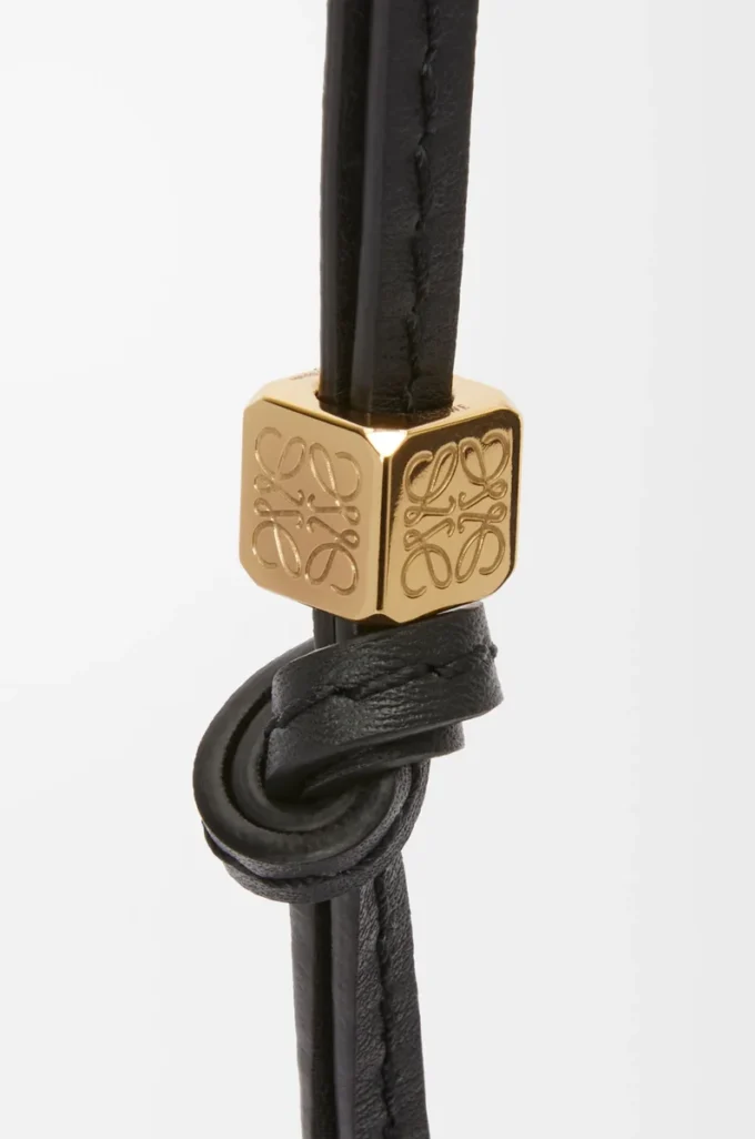 Small Anagram strap in calfskin Black Tonal/Gold