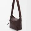 Small Cubi crossbody bag in supple grained calfskin Oxblood