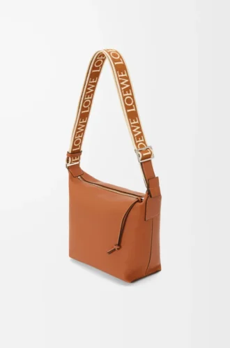 Small Cubi crossbody bag in supple smooth calfskin and jacquard Tan