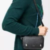 Small Pebble messenger bag in supple grained calfskin Black