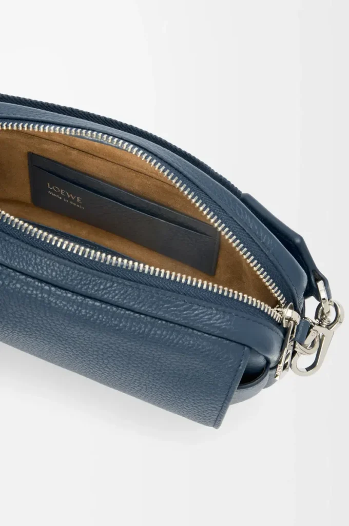 Small Pebble messenger bag in supple grained calfskin Indigo Dye