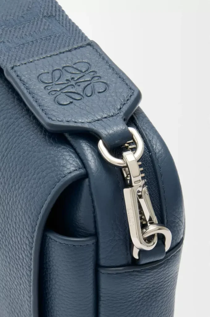 Small Pebble messenger bag in supple grained calfskin Indigo Dye