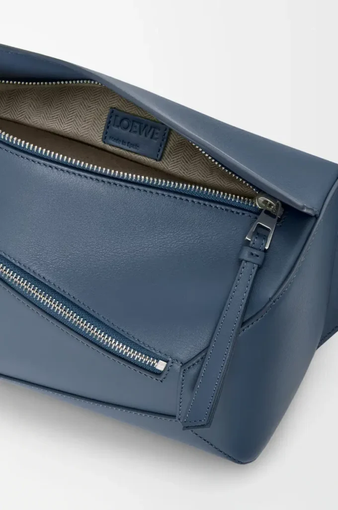Small Puzzle Edge bumbag in classic calfskin Indigo Dye Small Puzzle Edge bumbag in classic calfskin Indigo Dye