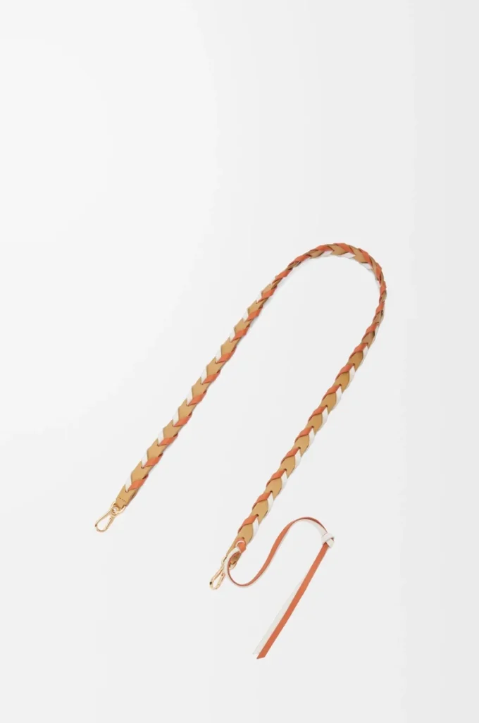 Thin braided strap in classic calfskin Soft White/Maple Orange Thin braided strap in classic calfskin Soft White/Maple Orange