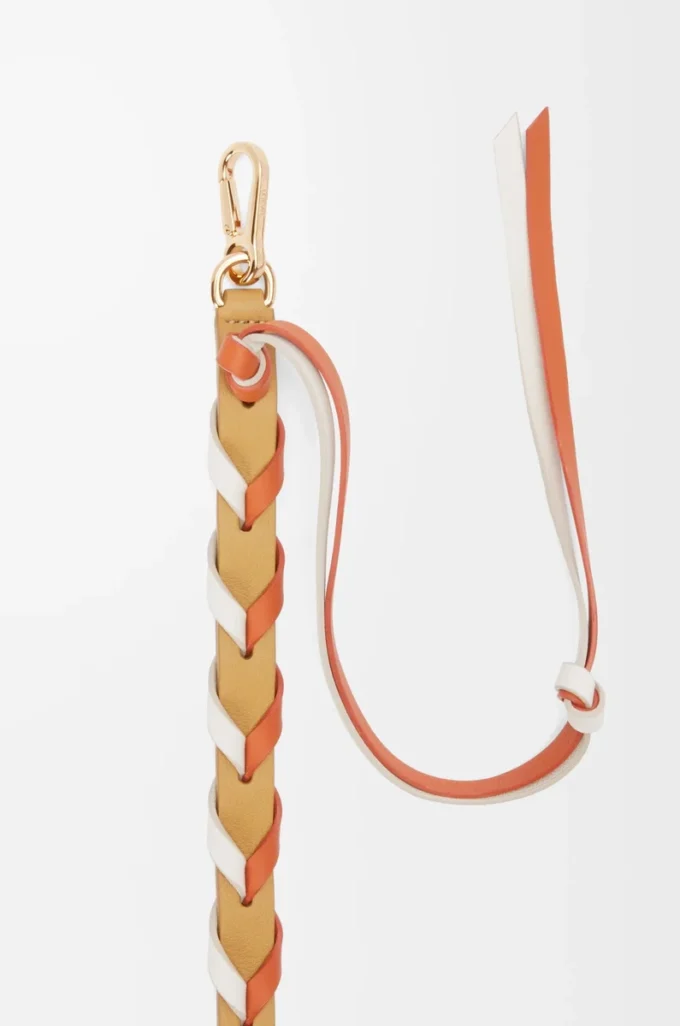 Thin braided strap in classic calfskin Soft White/Maple Orange Thin braided strap in classic calfskin Soft White/Maple Orange