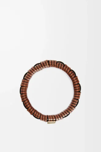 Woven bangle in brass and classic calfskin Tan