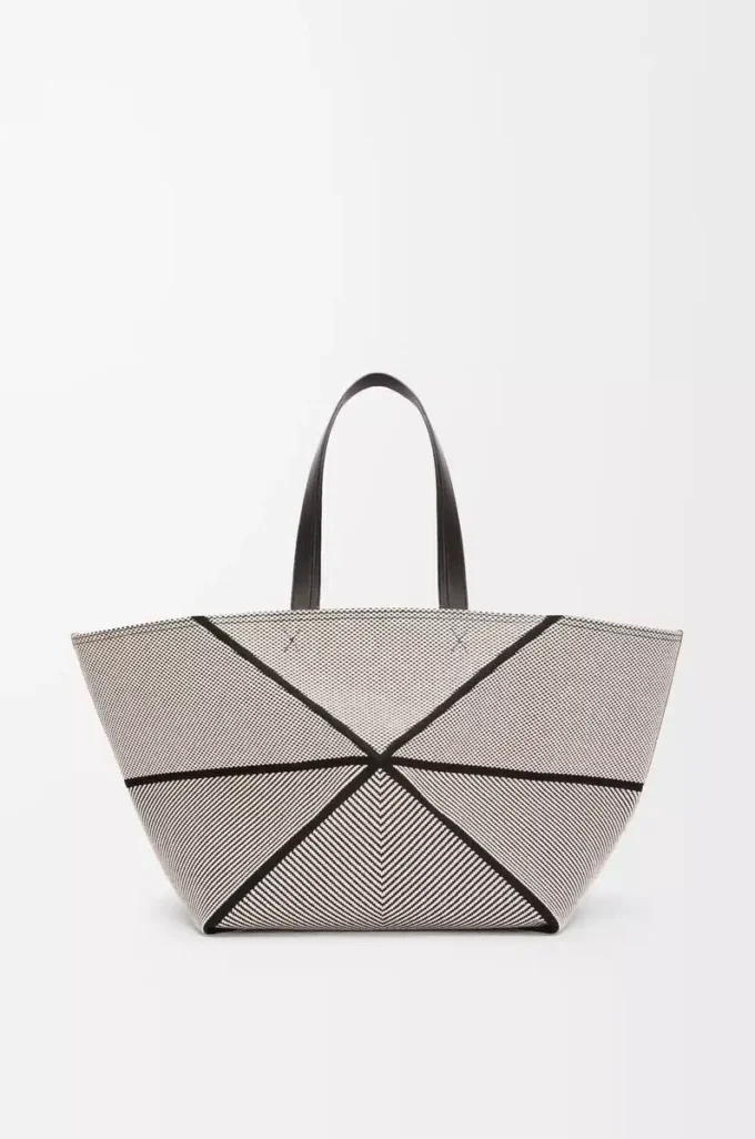 XXL Puzzle Fold tote in canvas jacquard and calfskin Natural/Black XXL Puzzle Fold tote in canvas jacquard and calfskin Natural/Black