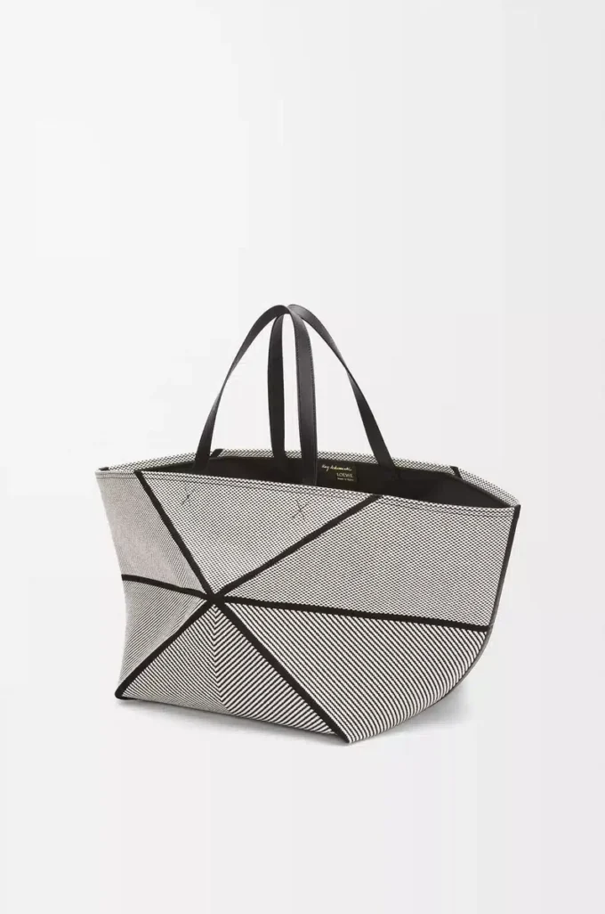 XXL Puzzle Fold tote in canvas jacquard and calfskin Natural/Black XXL Puzzle Fold tote in canvas jacquard and calfskin Natural/Black